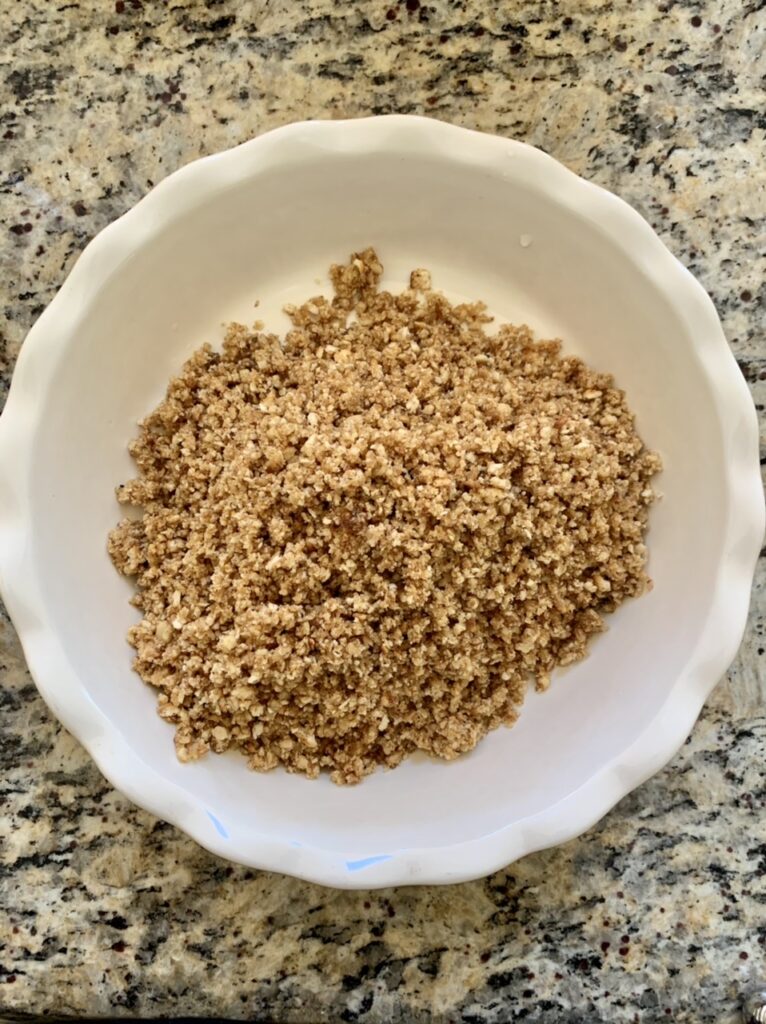Making  nut crust for Key Lime Pie