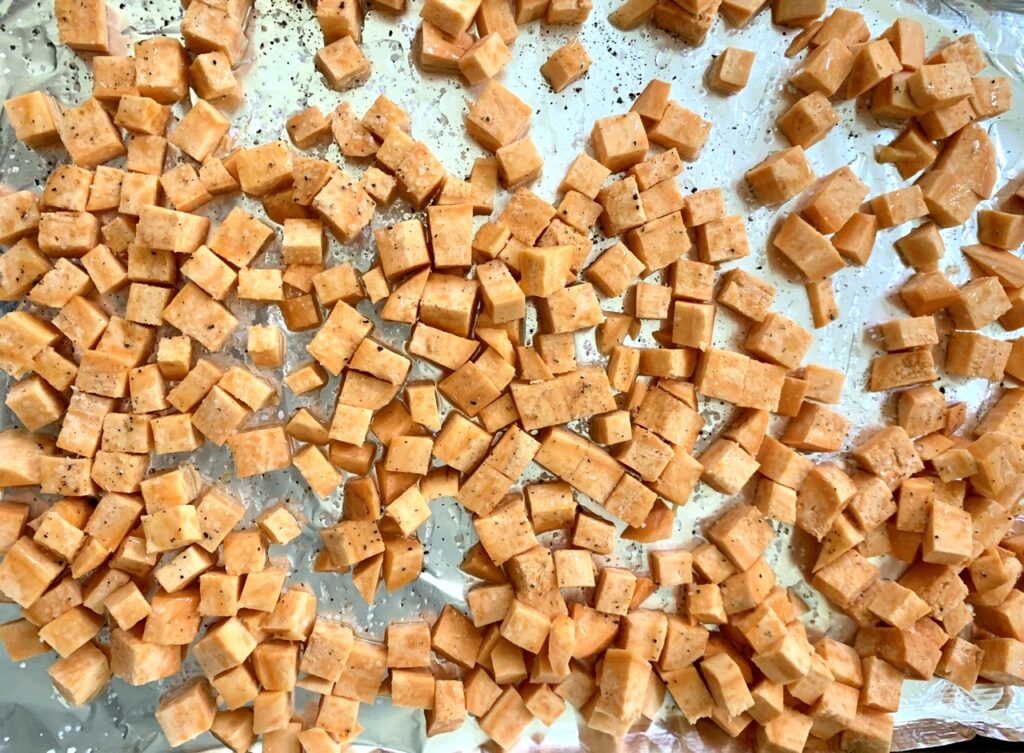 Preparing the sweet potatoes for roasting 