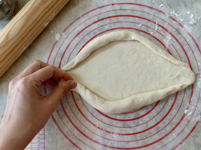 Shaping Adjaruli Khachapuri (Georgian Cheese Bread)
