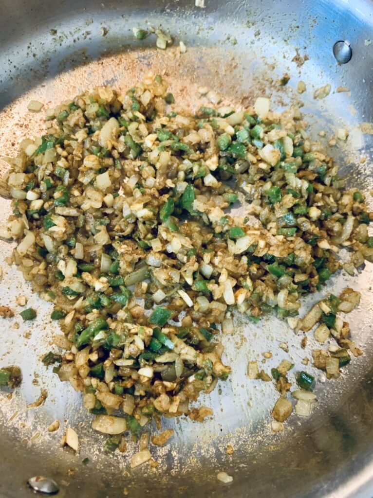 Preparing filling for Spicy Potato Samosas