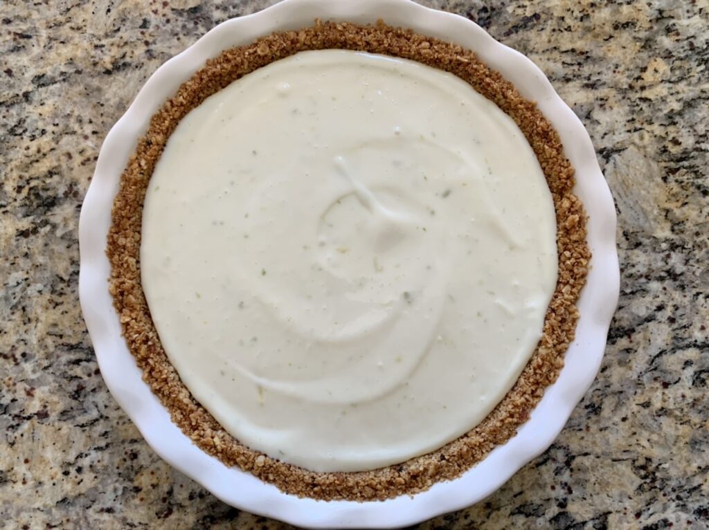 Gently tap the pan a few times to settle the filling