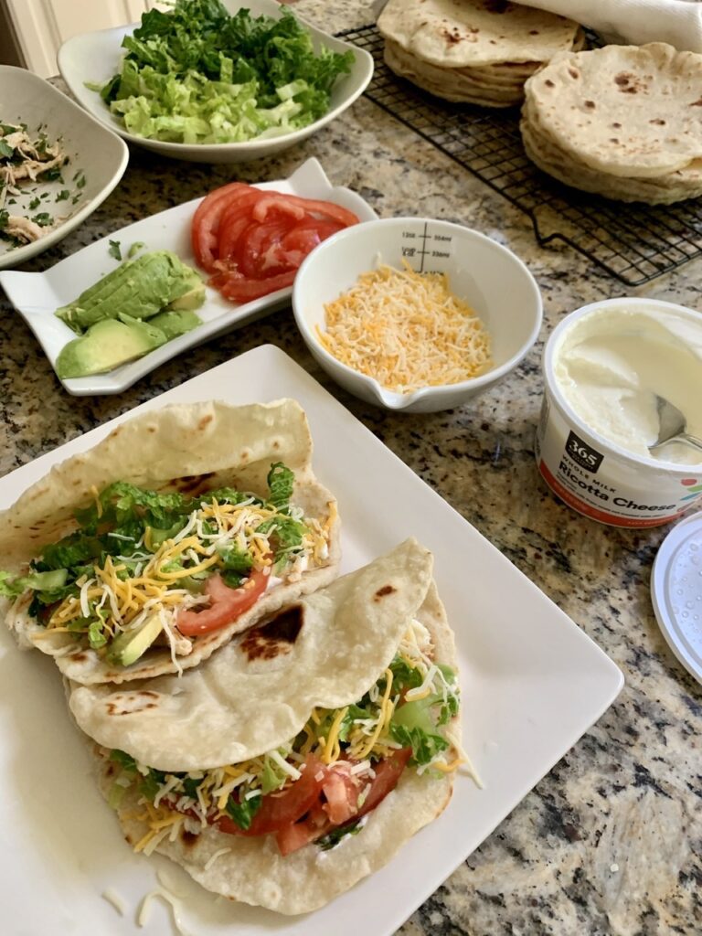 Assembling homemade soft taco using homemade delicious soft flour tortilla