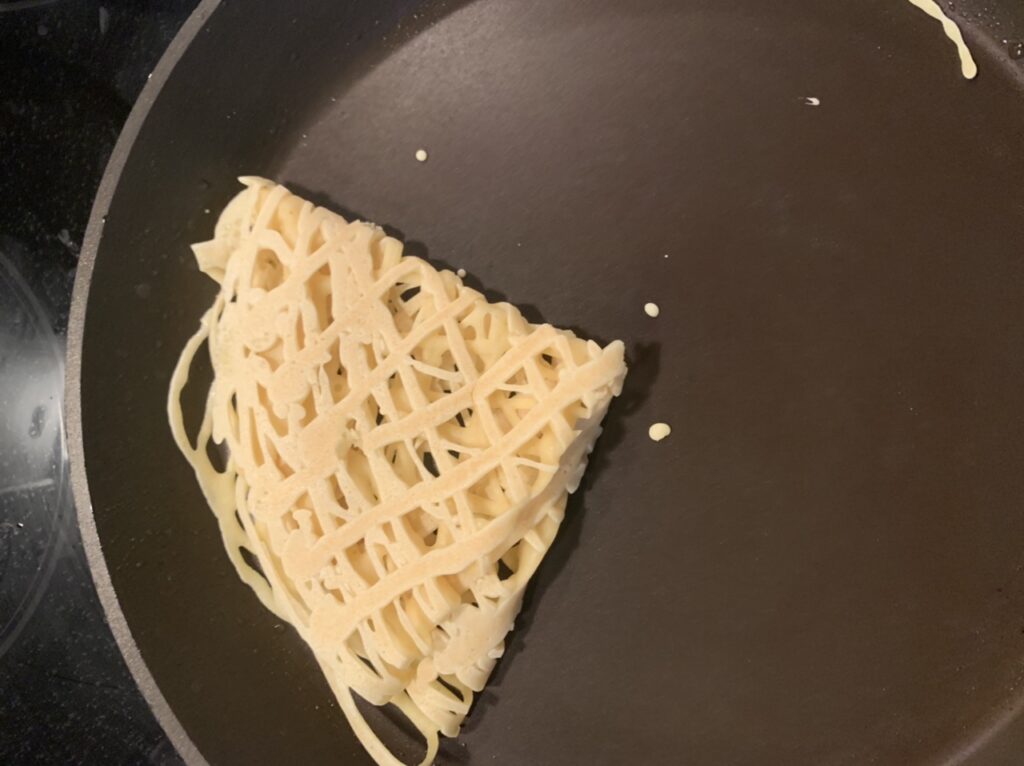 Folding Malaysian Roti Jala (Lacy Net Crepe)