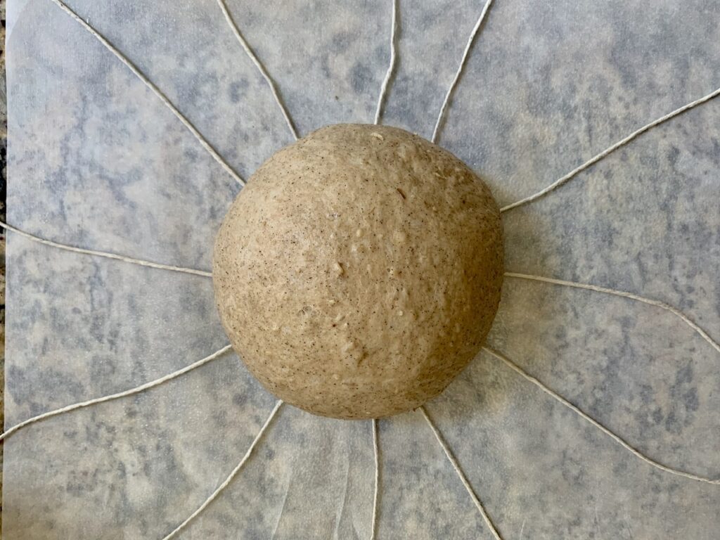 Transfer dough on top of twines