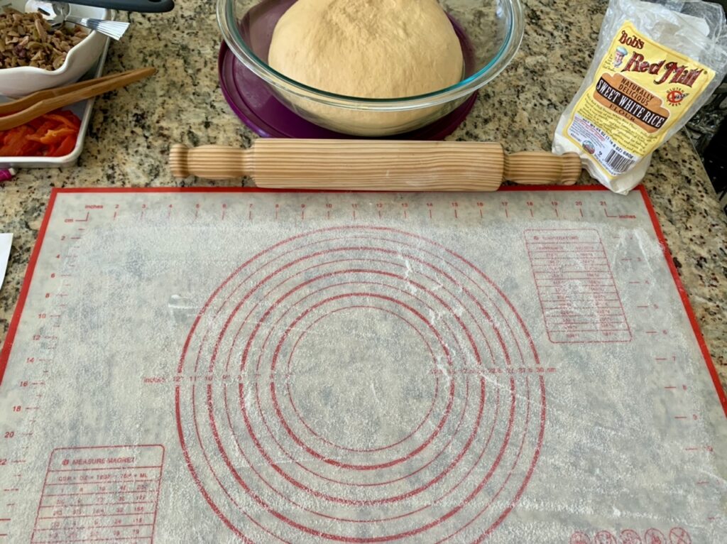 Prepping work space for Tulip Liner for Spanish Inspired Ham & Cheese Spiral Muffin Bread