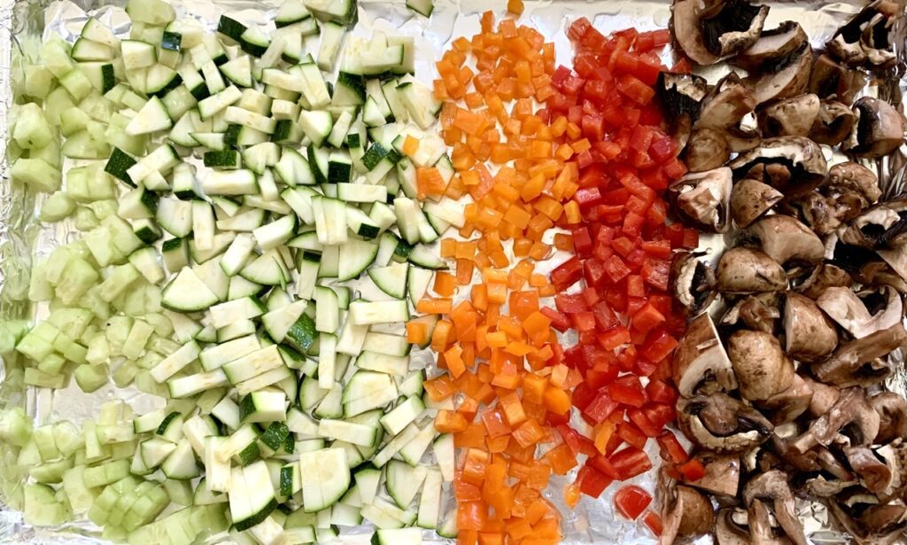 Preparing the colorful veggies for roasting
