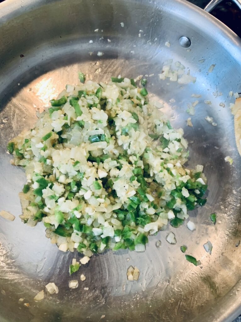 Preparing filling for Spicy Potato Samosas