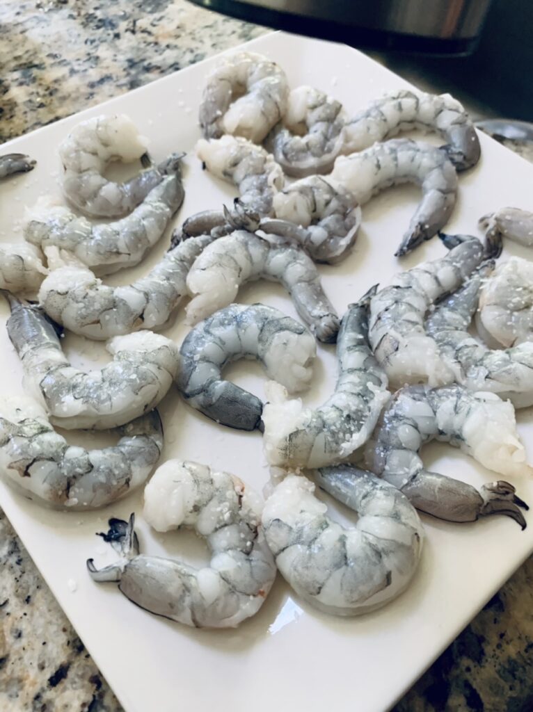 Preparing the shrimp for Scrumptious and Easy Shrimp and Grits