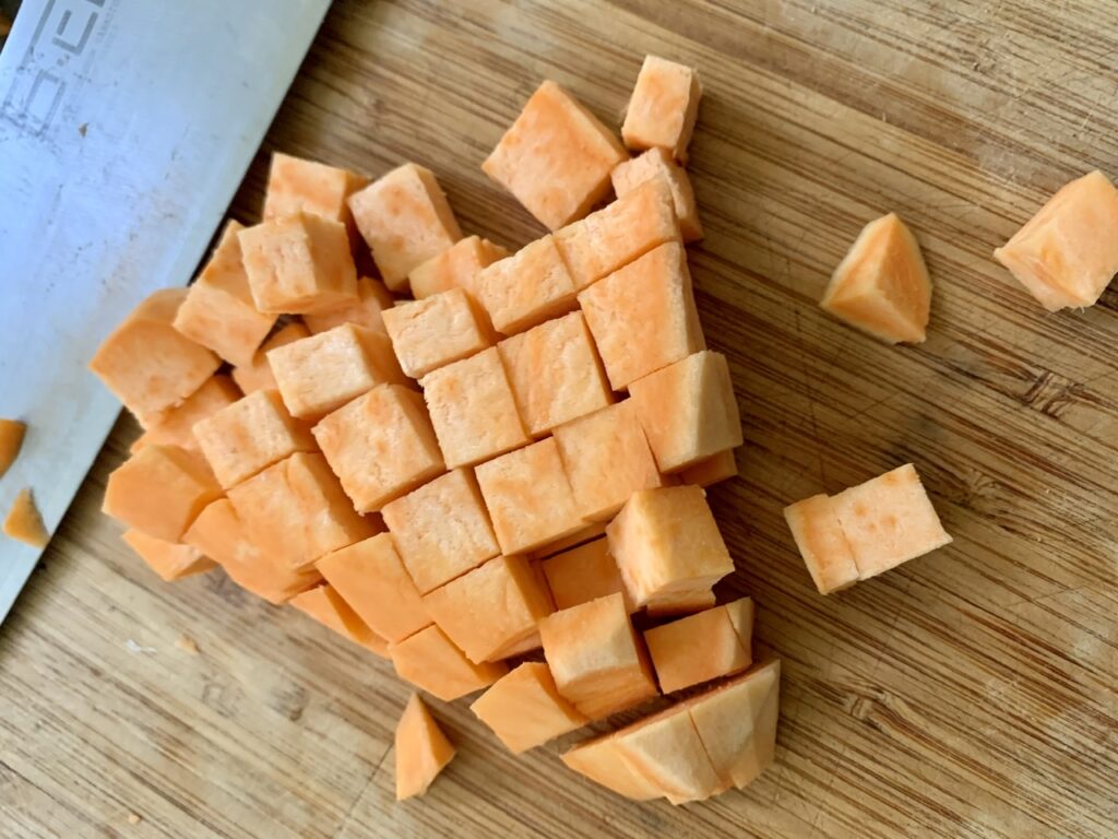 Cubing the sweet potatoes
